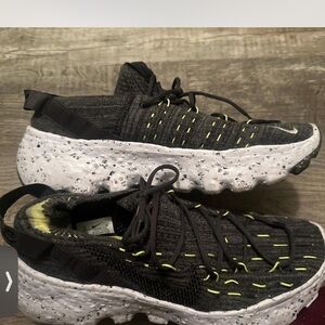 Nike Black and White Athletic Shoes with Yellow Accents